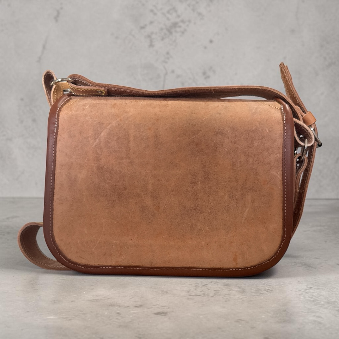 Open Colombian leather Carriel showing 9 organized pockets