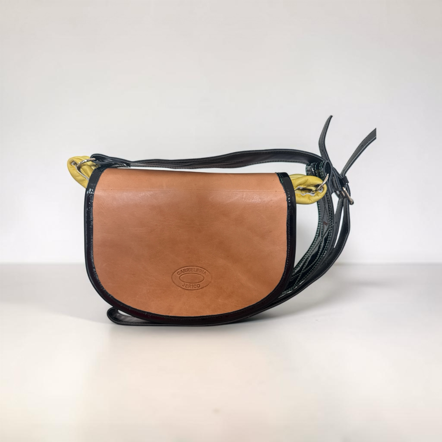 Open Carriel Jericoano showing hidden compartments and traditional Colombian design